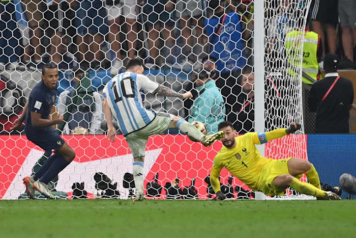 Lionel Messi pictured scoring his 13th World Cup goal for Argentina, in the 2022 final against France
